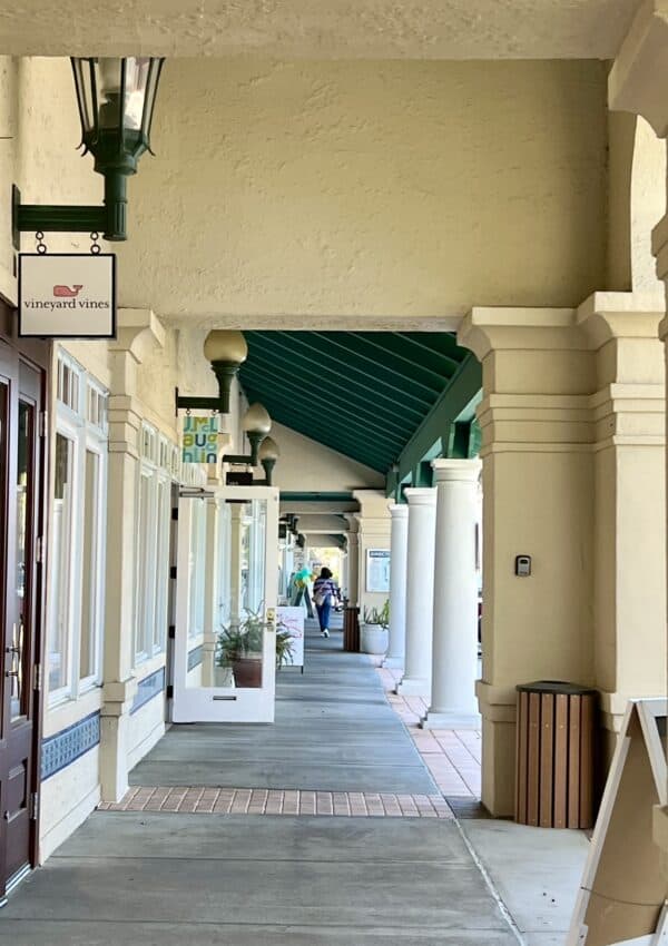 looking down sidewalk at Shops of Sea Island.
