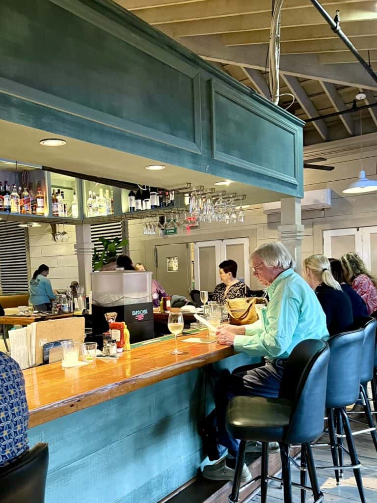 people at bar in St. Simons Island restaurant.