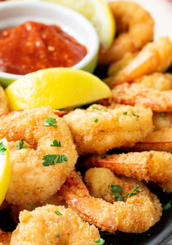 fried shrimp with lemon and cocktail sauce