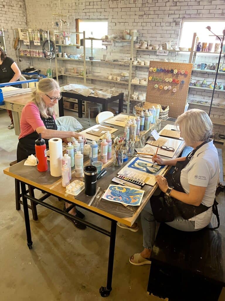 women creating art in studio in the Golden Isles