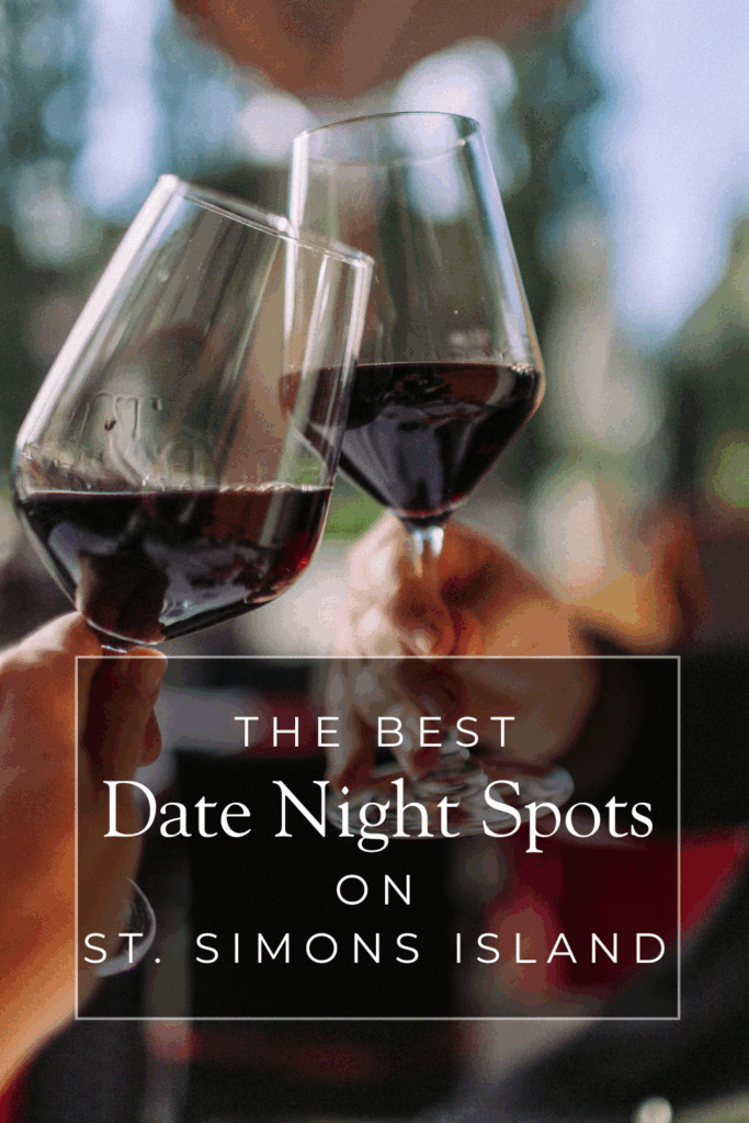 Text overlay reading "the best date night spots on st. Simons Island" with two hands with glasses of wine in background. 