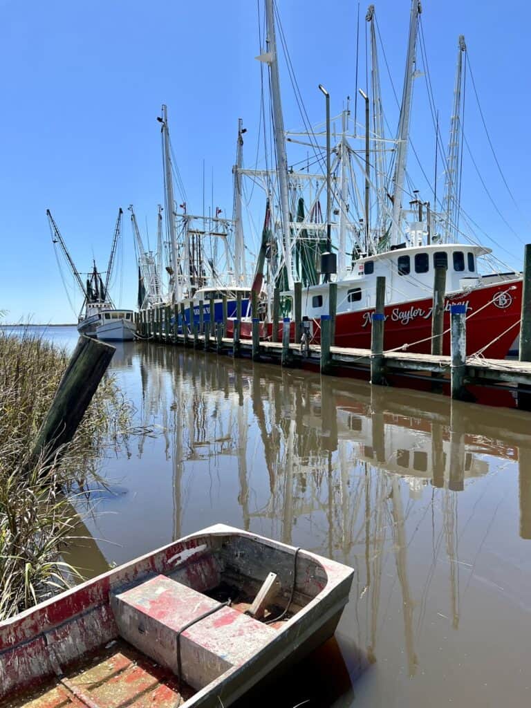 shrimp boats in water. 